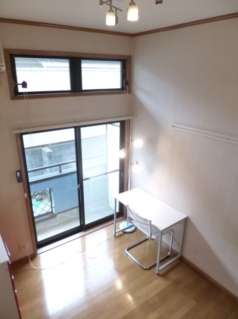 Living and room. It is a photograph taken from loft. 