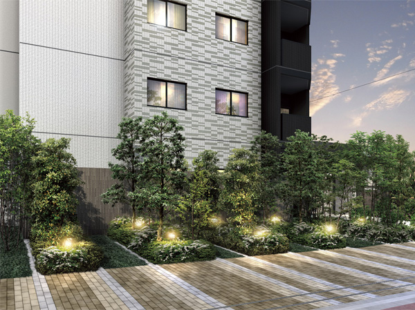Shared facilities.  [Garden lights and green approach] Garden lamps arranged in random lit the approach space. (Rendering)