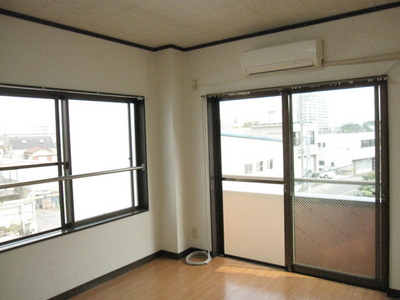 Living and room. Two windows, Bright studio in the two-sided lighting