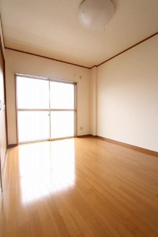 Other room space. Balcony side is the on-site parking.