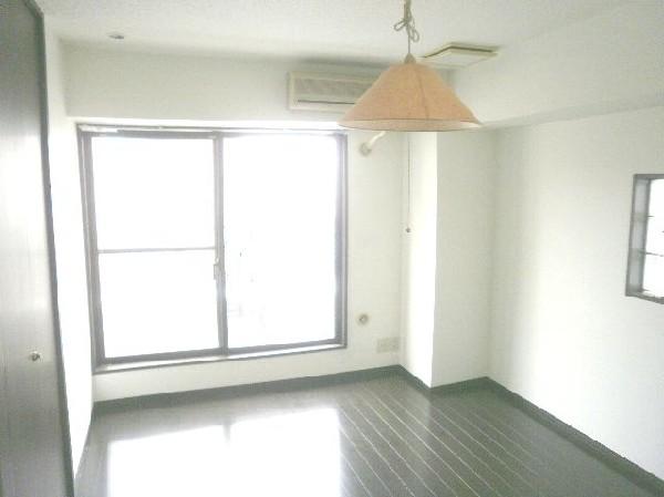 Non-living room. It is very bright because all the room is facing on the balcony