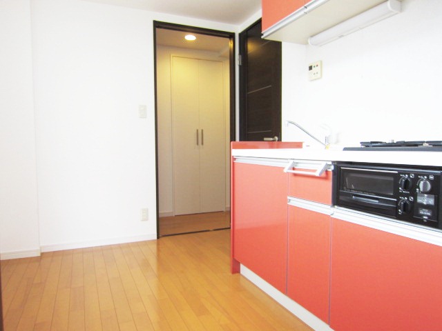 Living and room. Spacious kitchen space.