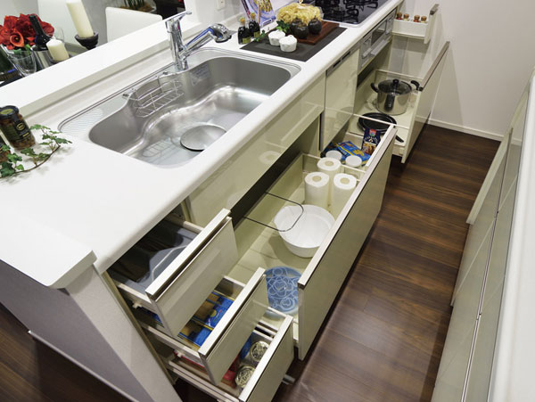 Kitchen.  [Sliding storage] Easy to put away easily taken out sliding storage. Also features a drawer slowly closing soft-close function.