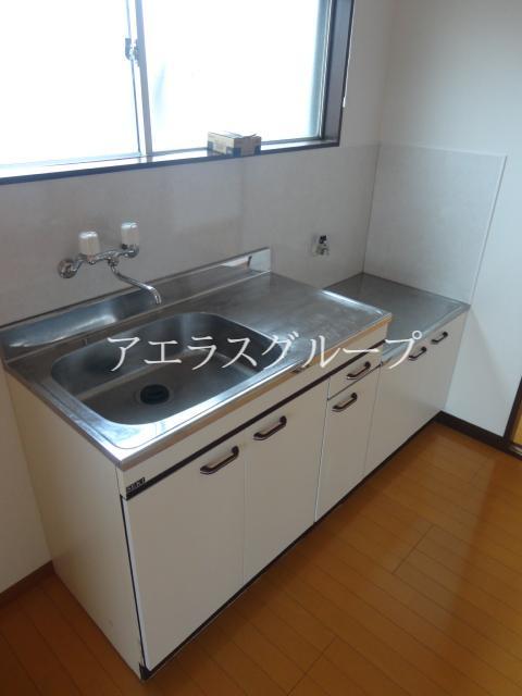 Kitchen. Kitchen there is a margin of cooking space the width of the dishes also spread