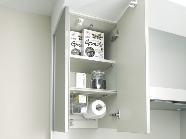 Kitchen.  [Paper holder built-in shelf cupboard] As quickly available if needed, It can be stored, such as kitchen towels and cooking sheet in easily accessible position of the hand.