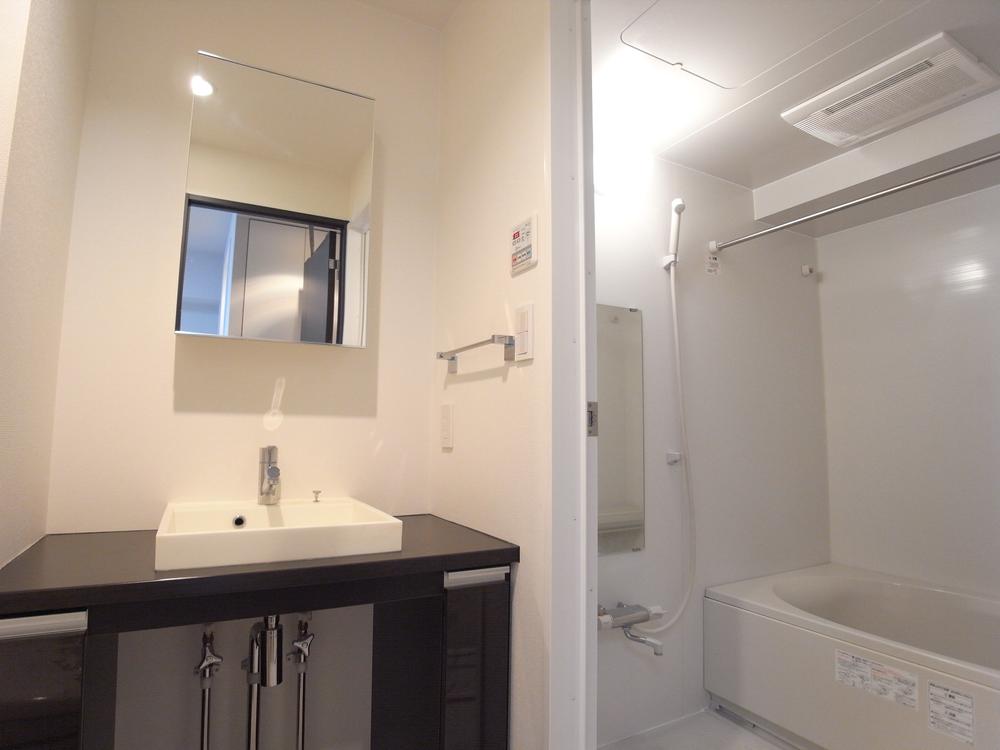 Bathroom. The bathrooms are equipped with 24-hour ventilation dryer. Pursuing stylish design is also vanity. Behind the Mirror is housed.