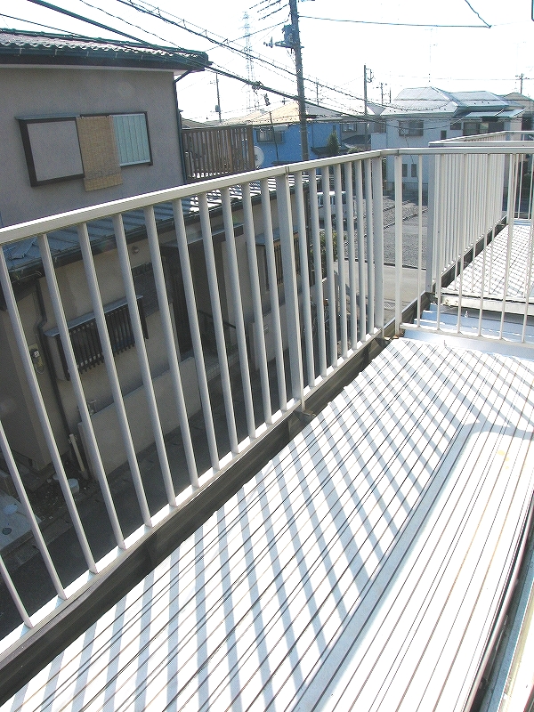 Balcony. Spacious balcony! Futon also Jose.