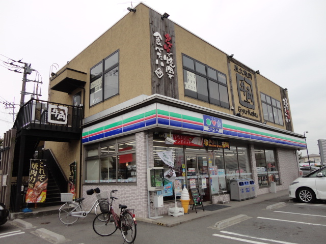 Convenience store. Three F Koshigaya Shinmei Machiten up (convenience store) 628m