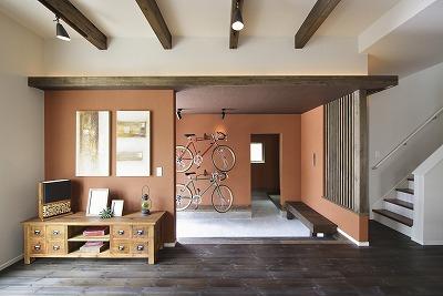 Living. Not try to decorate the bike and surfboard in "a dirt floor house"?