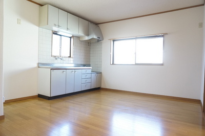 Kitchen. There is a window in the kitchen next to, Bright living room