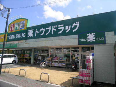 Dorakkusutoa. Tobu 440m to drag (drugstore)