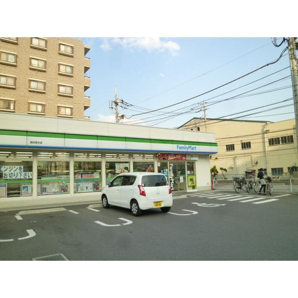 Convenience store. Family Mart Koshigaya 239m to the west shop