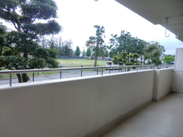 Balcony. Wide veranda facing south. Since the front of the garden and the road sunny