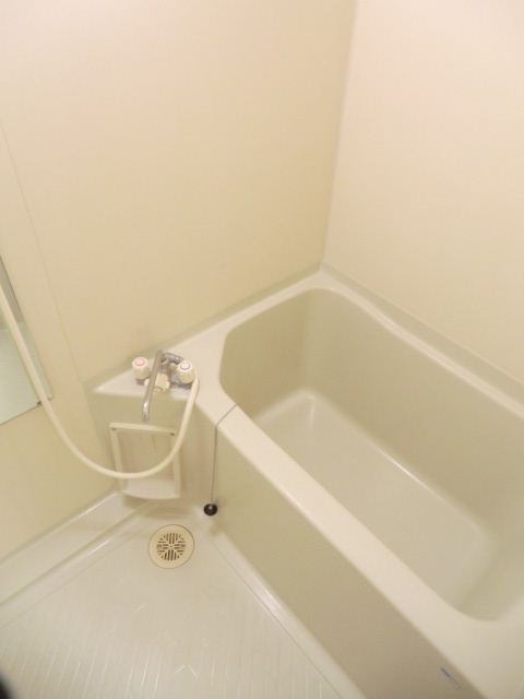 Bath. White is a spacious bathtub with clean which was the keynote.