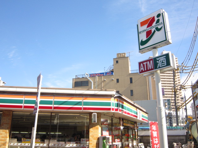 Convenience store. Seven-Eleven Kita-Koshigaya Station West Exit store up (convenience store) 429m