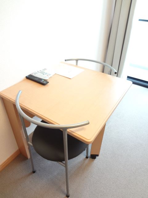 Other Equipment. It is a folding table. There is also a chair.