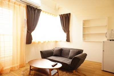 Living and room. sofa ・ table ・ With curtain