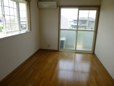 Living and room. With bay windows in the corner room