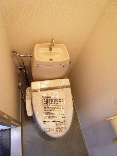 Toilet. With warm water washing toilet seat