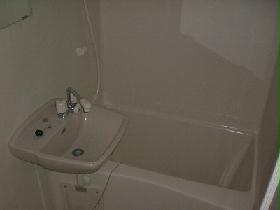 Bath. It is a bath with a bathroom dryer. 
