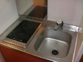Kitchen. Cooked in a two-burner stove is smooth. 