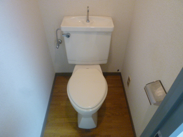 Toilet. The same is by Property of the room.