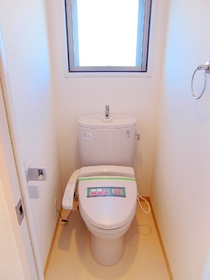 Toilet. It is a photograph of another room of the same properties