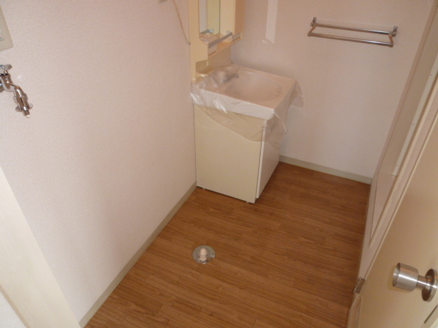 Washroom. It is a photograph of another room of the same properties