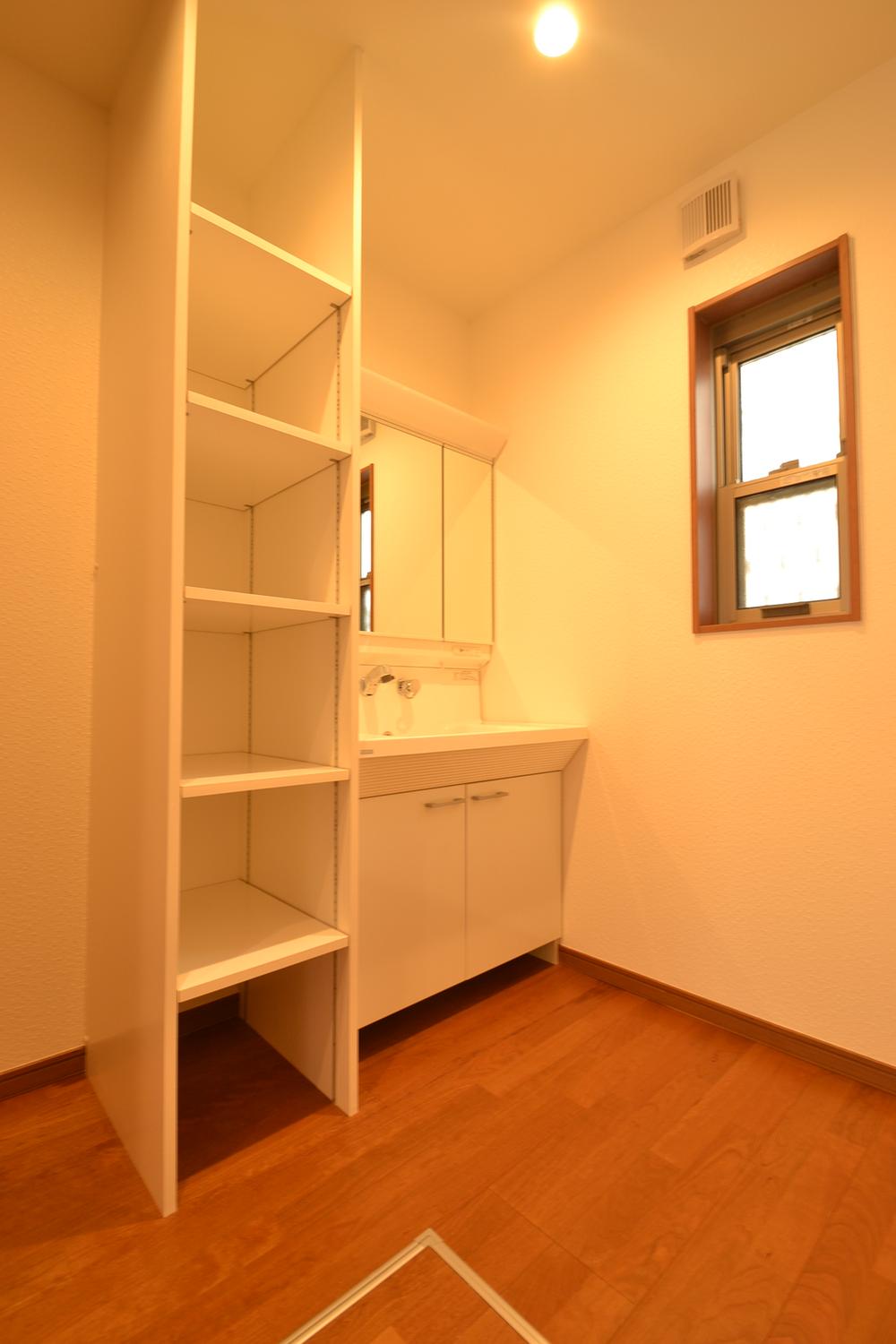 Wash basin, toilet. A Building