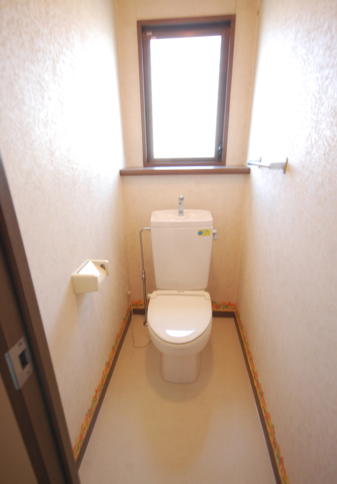 Toilet. There are window