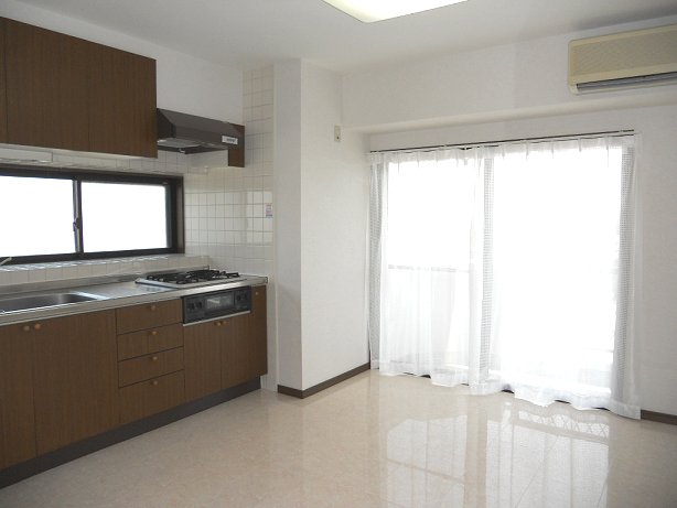 Living and room. Bright ventilated dining facing the east balcony