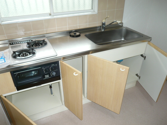 Kitchen. Same property, Is another of the room. 