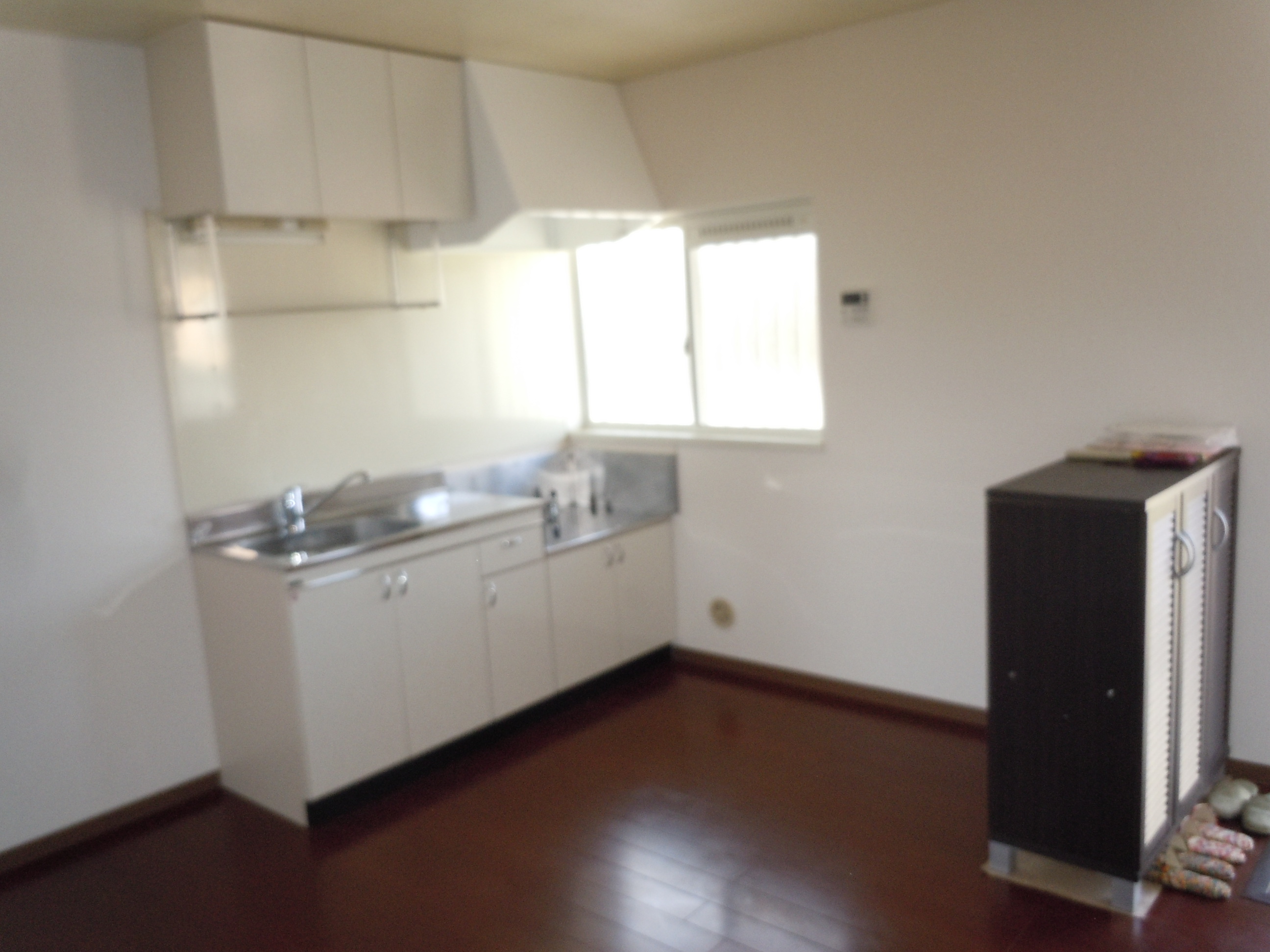 Kitchen. Window is attached to the kitchen next to. 