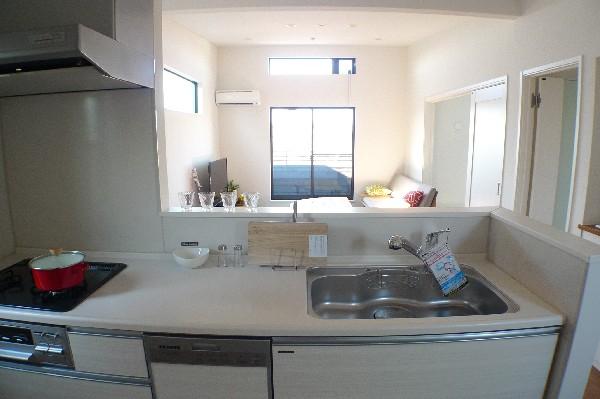 Kitchen. This face-to-face kitchen overlooking the living room.