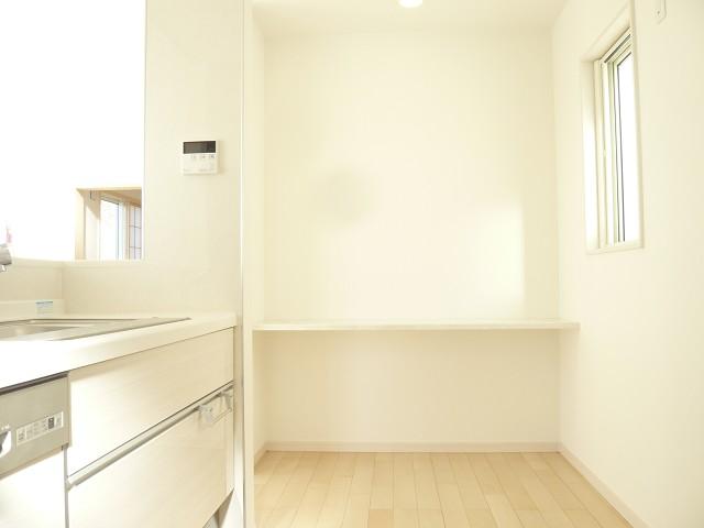 Kitchen. Mrs. corner were fixtures on the side of the B Building Kitchen.