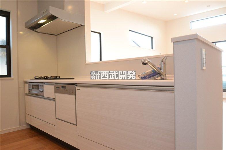 Kitchen. There is a sense of open open kitchen