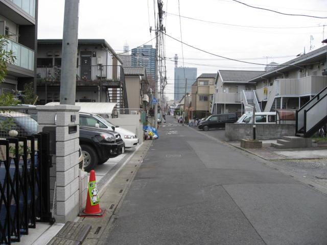 Local photos, including front road. It is a quiet residential area.