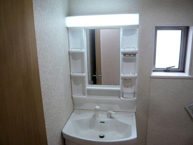 Wash basin, toilet. Vanity unit
