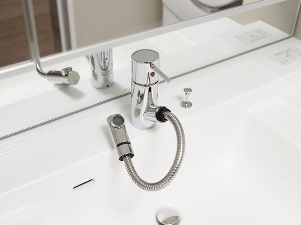 Bathing-wash room.  [Mixing faucet single lever] Mixing faucet single lever that can be temperature-controlled with one hand. By extending the faucet nozzle, Wash you up to every nook and corner also wash bowl.