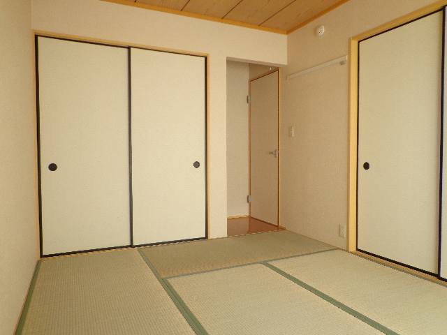 Other room space. The photograph is on the second floor of the room.