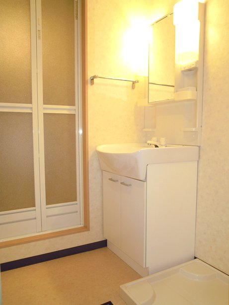 Washroom. Dressing room with a Laundry Area