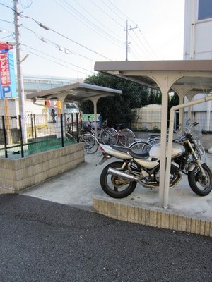 Other common areas. Bicycle does not wet in the rain. Bicycle parking lot with a roof