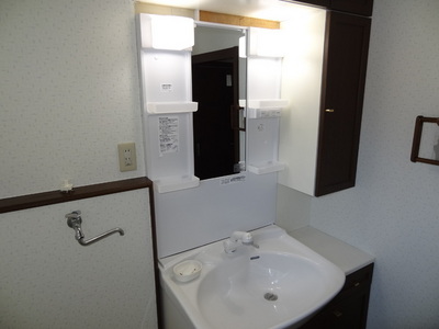 Washroom. Hotel is a wash basin of like