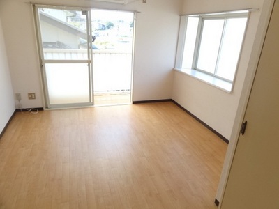 Living and room. With bay windows in the corner room