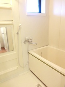 Bath. Bright bathroom with a window