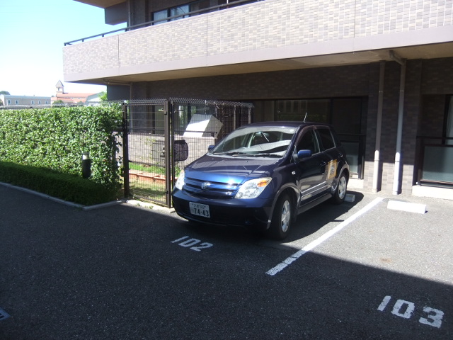 Parking lot. 1 car parking space in front of the room