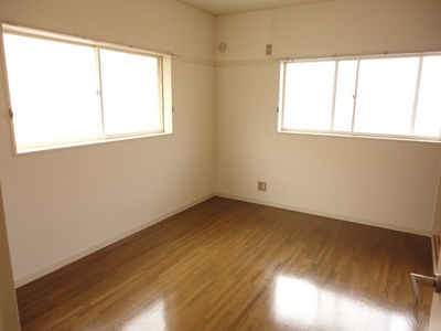 Living and room. It is very bright and airy rooms there is a window on two sides