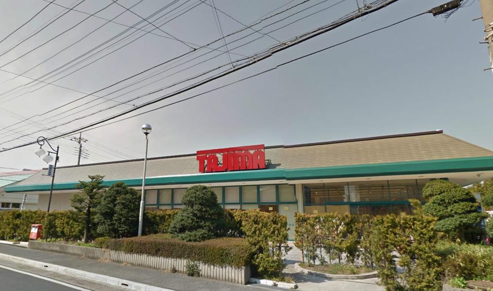 Supermarket. SUPER MARKET Tajima Kizaki to the store 1410m