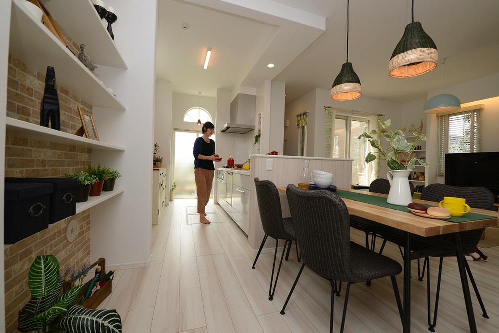 Model house photo. Open and bright kitchen