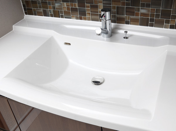Bathing-wash room.  [Artificial marble basin counter & nozzle type mixing faucet] Seamless, Clean bowl integrated basin counter. Also, Tip nozzle of adopted nozzle type mixing faucet draw.